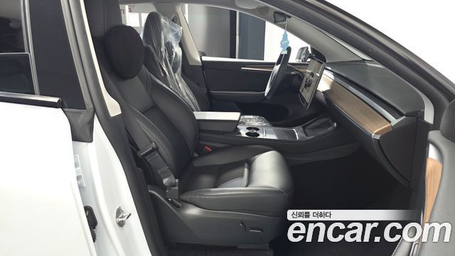 Tesla Model Y 2024 — photo 16