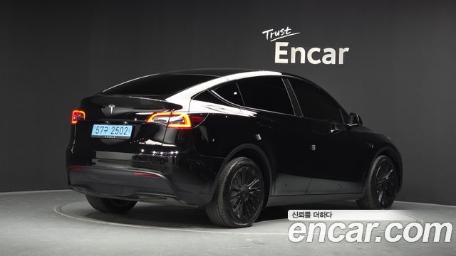 Tesla Model Y 2022 — photo 2