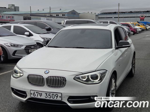 BMW 1-Series 2015 — photo 1