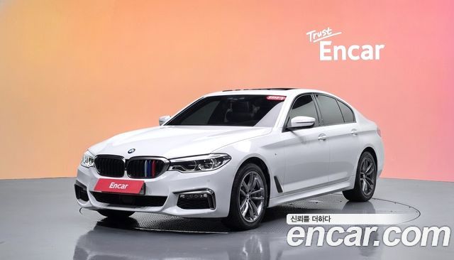 BMW 5-Series 2018 — photo 1