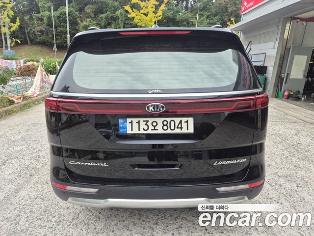 Kia Canival 2021 — photo 2