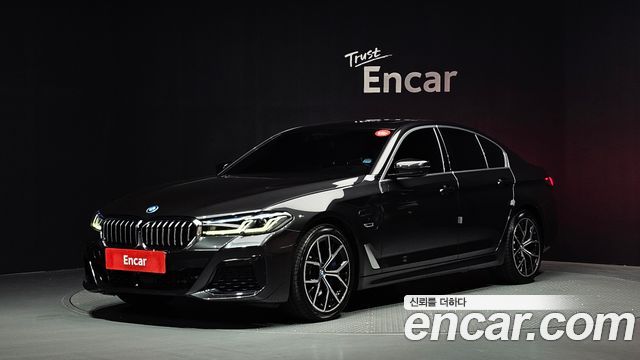 BMW 5-Series 2023 — photo 1