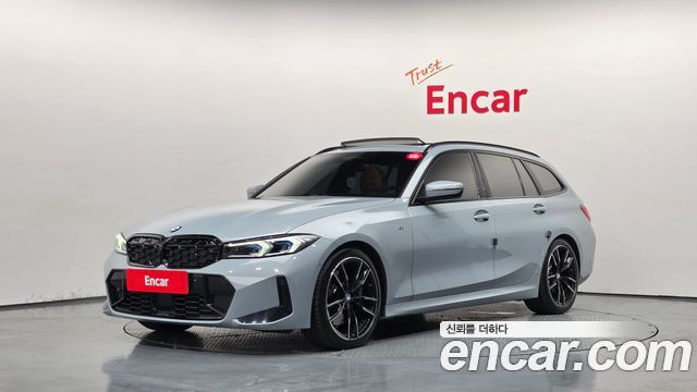 BMW 3-Series 2023 — photo 1