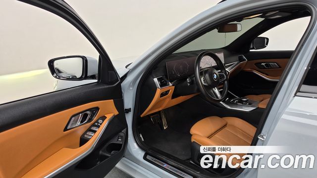 BMW 3-Series 2023 — photo 13