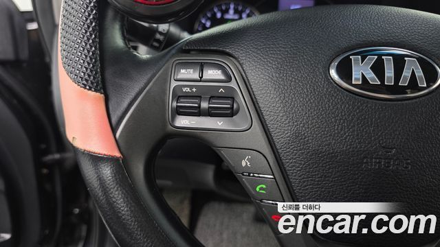 Kia K3 2014 — photo 17