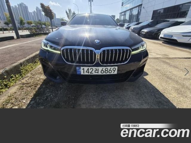BMW 5-Series 2023 — photo 1
