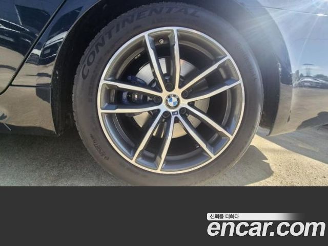 BMW 5-Series 2023 — photo 17