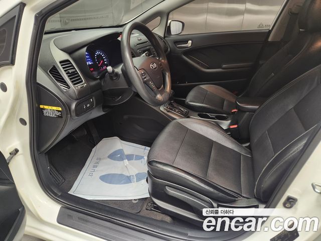Kia K3 2015 — photo 11