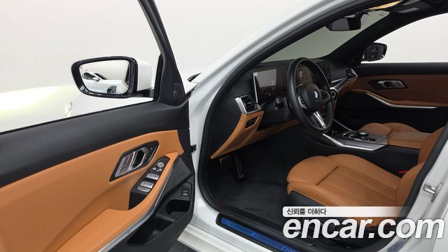 BMW 3-Series 2024 — photo 10