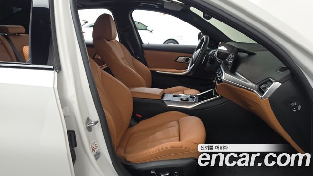BMW 3-Series 2024 — photo 11