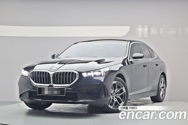 BMW 5-Series 2024 — photo 1