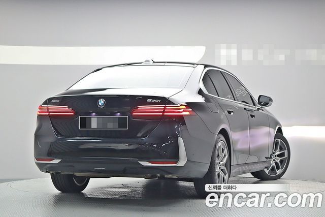 BMW 5-Series 2024 — photo 2