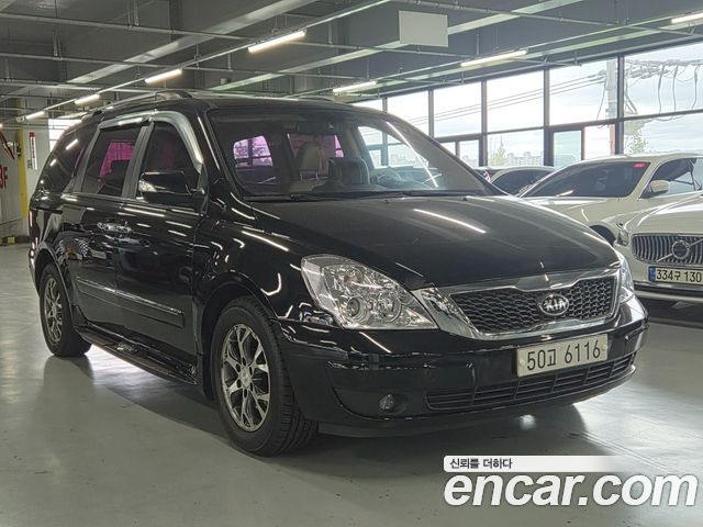 Kia Canival 2014 — photo 2