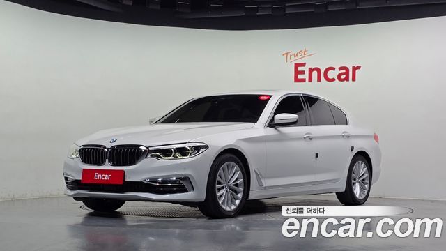 BMW 5-Series 2018 — photo 1