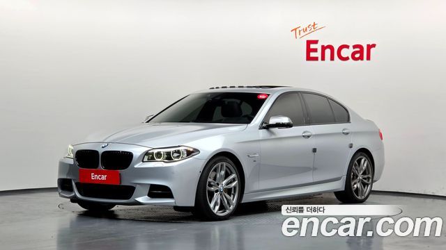 BMW 5-Series 2015 — photo 1