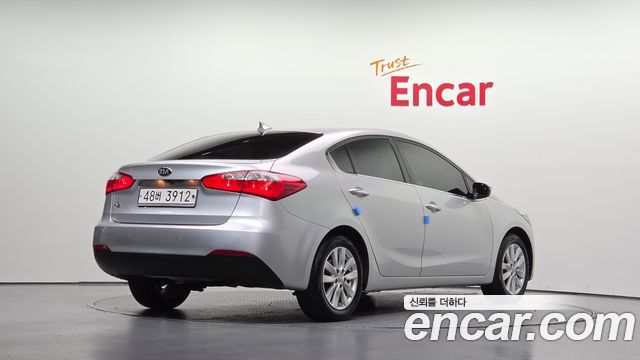 Kia K3 2014 — photo 2