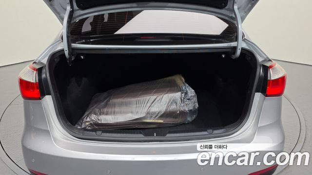 Kia K3 2014 — photo 20