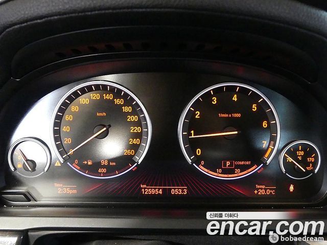 BMW 7-Series 2009 — photo 8