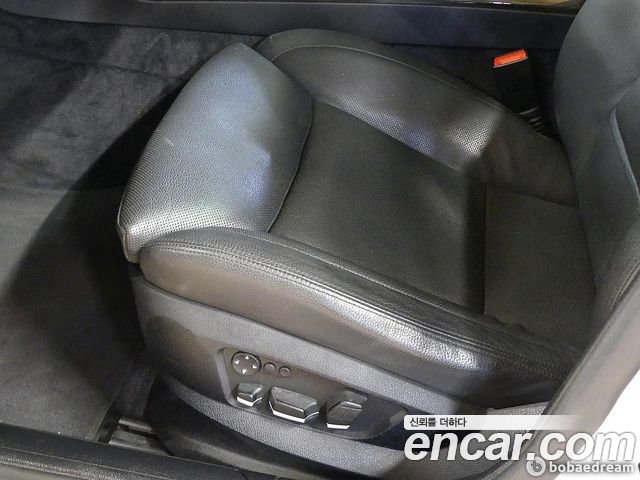 BMW 7-Series 2009 — photo 16