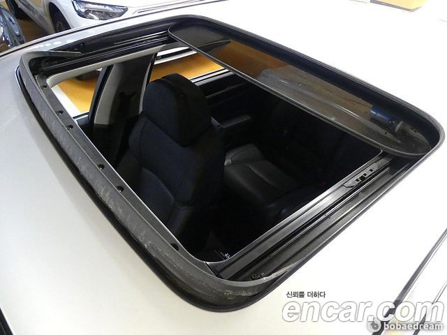 BMW 7-Series 2009 — photo 17