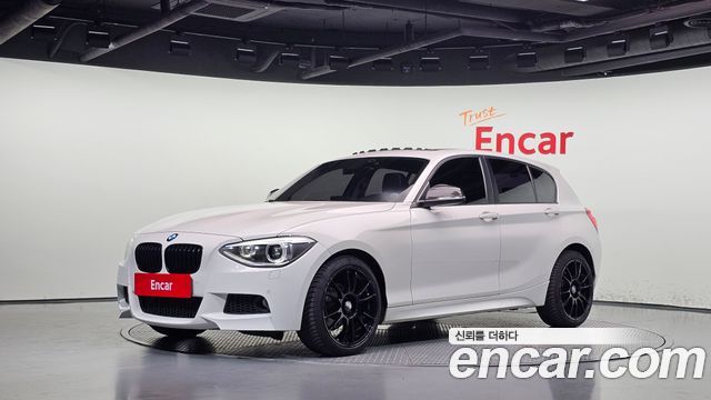 BMW 1-Series 2014 — photo 1