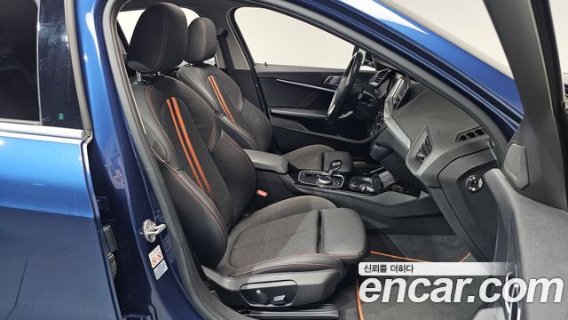 BMW 1-Series 2021 — photo 16