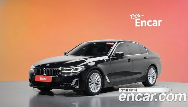 BMW 5-Series 2023 — photo 1