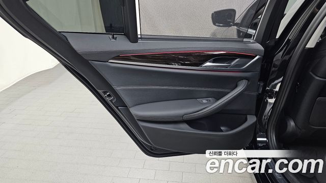BMW 5-Series 2023 — photo 15