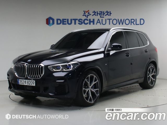 BMW X5 2022 — photo 1