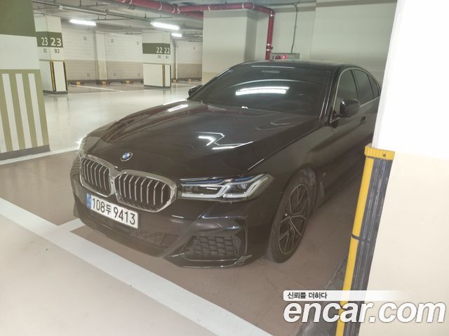 BMW 5-Series 2023 — photo 1