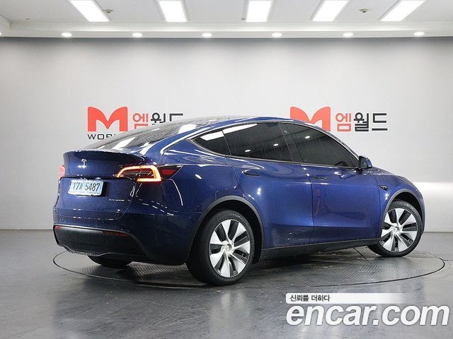 Tesla Model Y 2021 — photo 2
