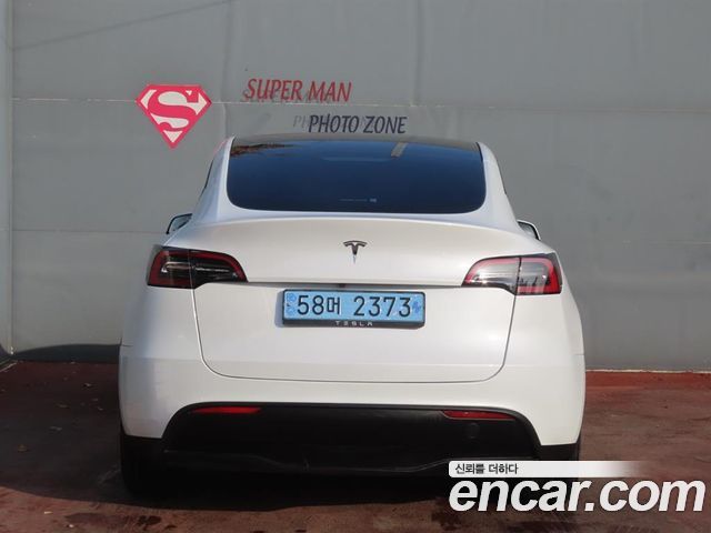 Tesla Model Y 2024 — photo 4