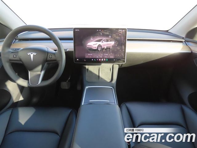 Tesla Model Y 2024 — photo 7