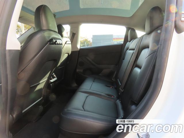 Tesla Model Y 2024 — photo 11
