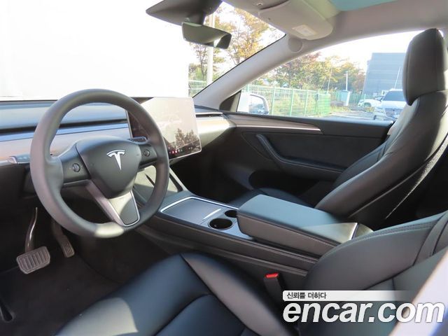 Tesla Model Y 2024 — photo 12