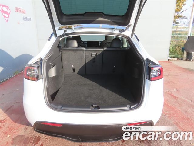 Tesla Model Y 2024 — photo 17