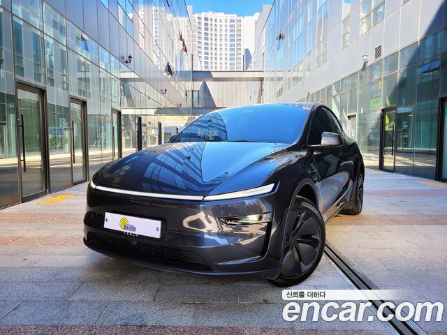 Tesla Model Y 2025 — photo 1