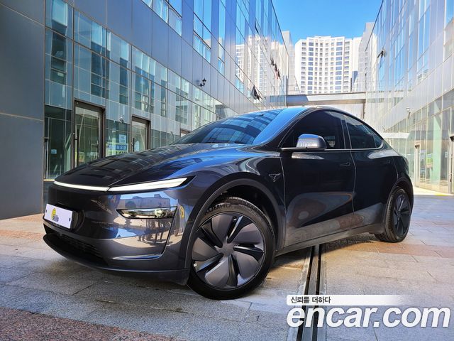 Tesla Model Y 2025 — photo 2