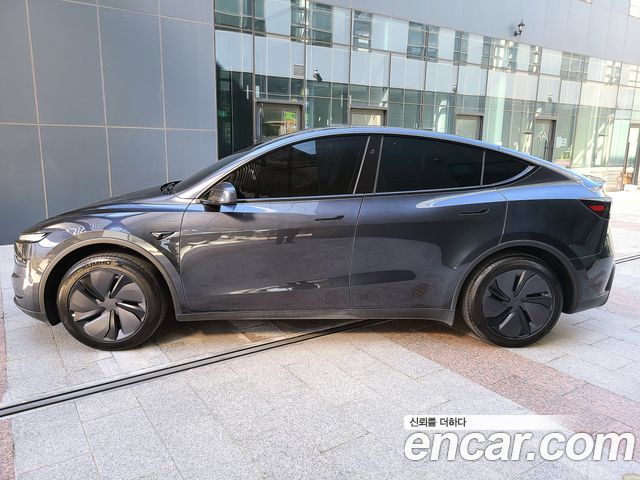 Tesla Model Y 2025 — photo 4