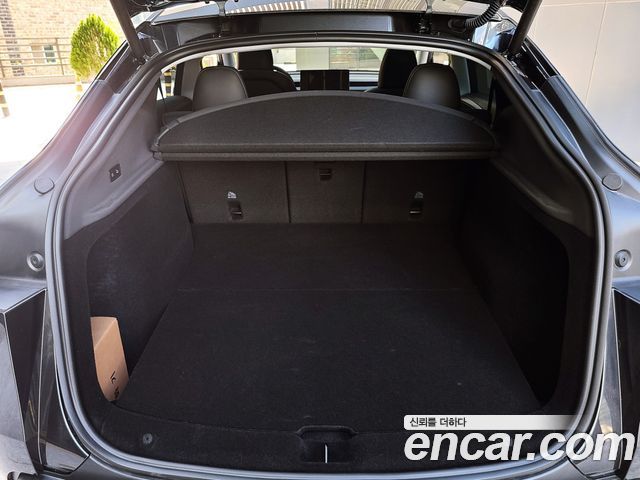 Tesla Model Y 2025 — photo 17