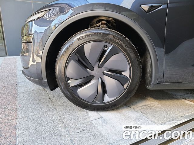 Tesla Model Y 2025 — photo 20