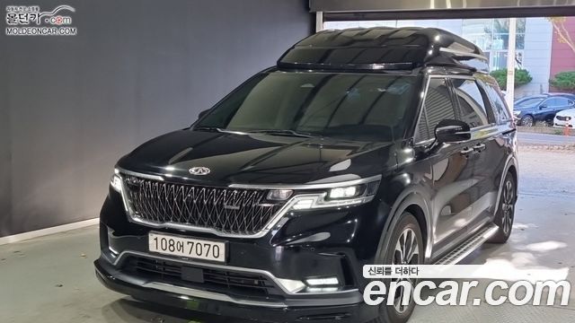 Kia Canival 2021 — photo 1
