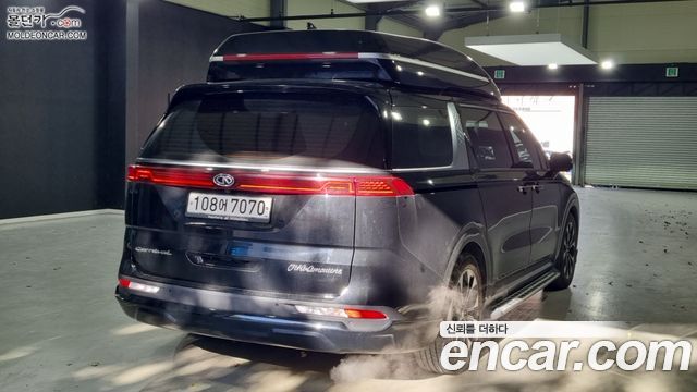 Kia Canival 2021 — photo 2