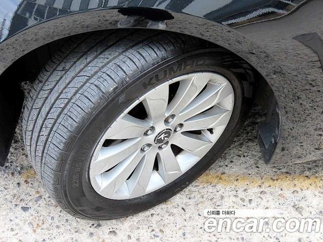 Kia K7 2012 — photo 17