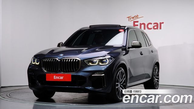 BMW X5 2021 — photo 1