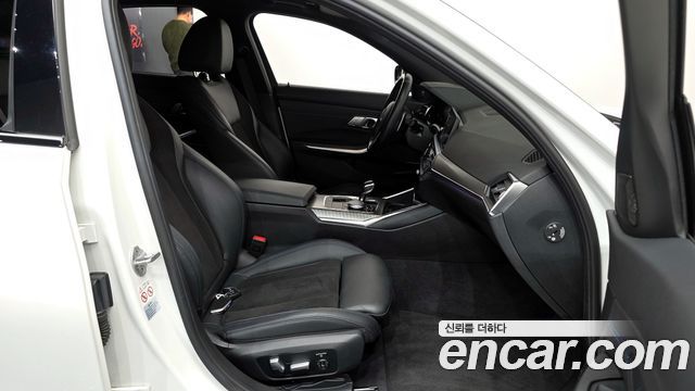 BMW 3-Series 2021 — photo 11