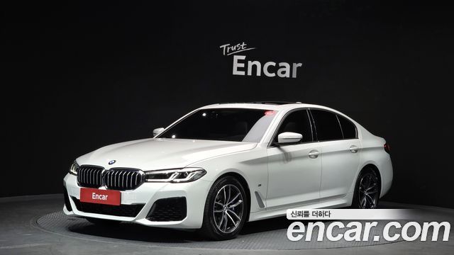 BMW 5-Series 2022 — photo 1
