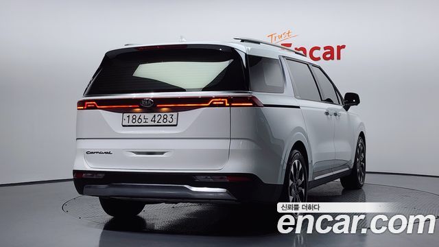 Kia Canival 2021 — photo 2