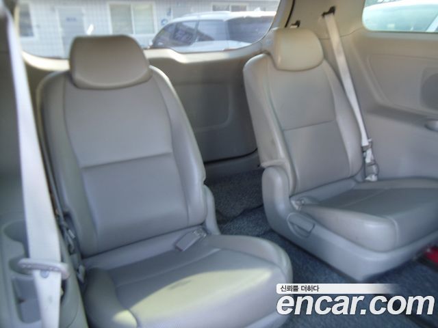 Kia Canival 2015 — photo 14