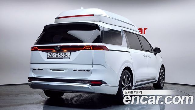 Kia Canival 2021 — photo 2
